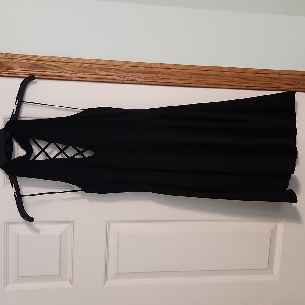 Womens size medium fit and flare dress with criss cross detail, halter style